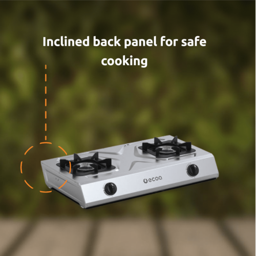 Inclined back panel for safe cooking